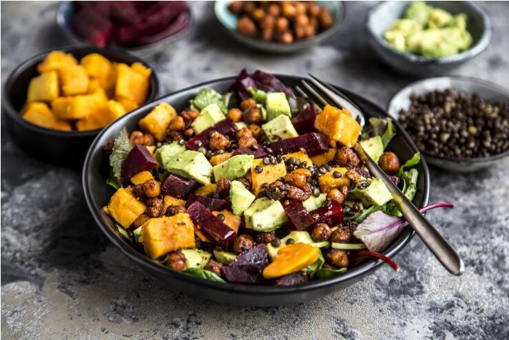 Superfood salad, avocado, beetroot, roasted chickpea, sweet potatoe, beluga lentil and blood orange