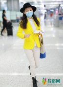 吴倩机场造型 戴礼帽穿黄色西装十足抢眼